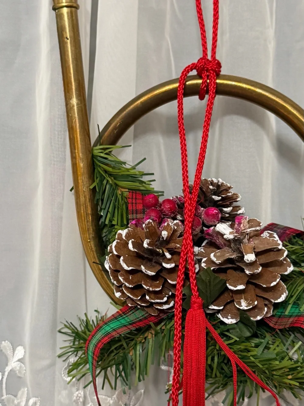 Holiday Brass Horn Ornament with Pinecone and Red Tassel